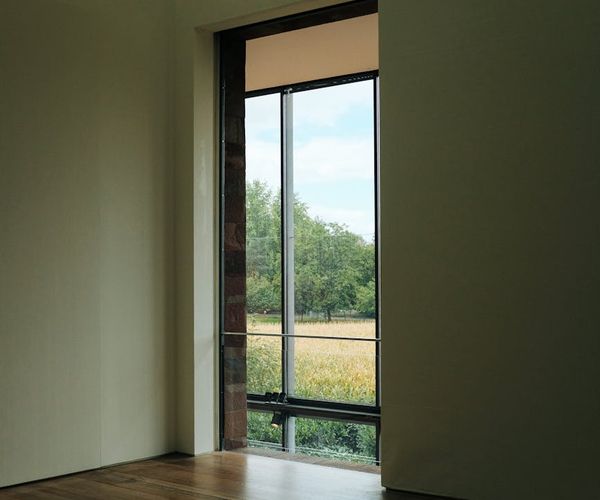 A calm and clean studio space with natural light.